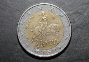 Fotografías macro de monedas de euro fondo moneda de 2 euros año de fabricación 2002 país grecia impresiones de gran tamaño de alta calidad foto