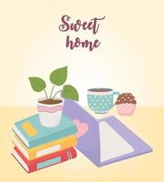dulce hogar portátil taza de café cupcake pila de libros planta en maceta