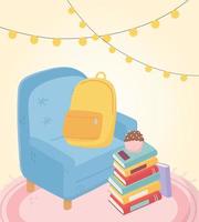 Sweet Home sillón mochila cupcake en pila de libros y luces