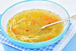 Soup with Chicken Broth. Noodles and Vegetables photo