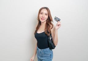 portrait beautiful Asian woman holding credit card photo