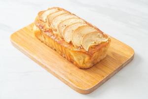 apple loaf crumbled on wood board photo