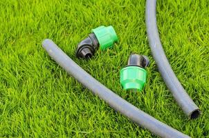 Plastic and hose for automatic watering the garden photo