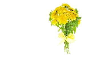 beautiful Bouquet of blooming yellow dandelions. Photo