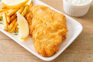 fish and chips - fried fish fillet with potatoes chips photo