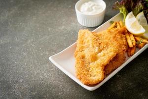 fish and chips - fried fish fillet with potatoes chips photo