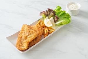 fish and chips - fried fish fillet with potatoes chips photo