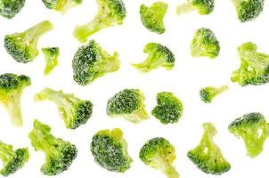 Preservation of vegetables, frozen broccoli cabbage on white background photo