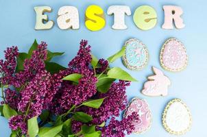 Easter composition, homemade cookies on bright background. photo