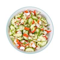 Vegetarian appetizer of cucumber, celery and surimi photo