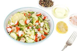 Vegetarian appetizer of cucumber, celery and surimi photo