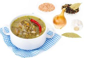 Tasty hot soup with lentils and celery. photo