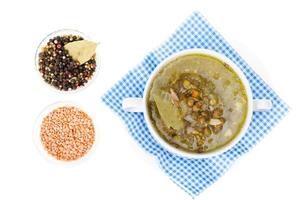 Tasty hot soup with lentils and celery. photo