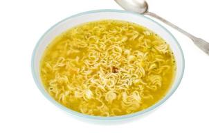 Broth with dry instant noodle. Photo Studio