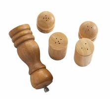 wooden pepper and salt shaker on white background photo