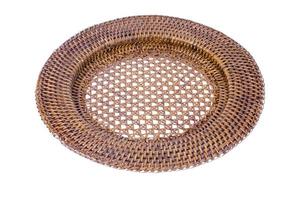 Brown decorative wicker plate isolated on white background. photo