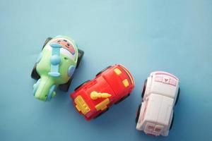 colorful plastic toys on blue background photo