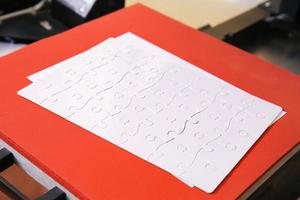 Blank puzzle for printing on table photo