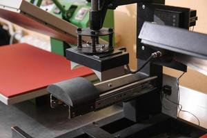 Modern printing machine at workplace photo