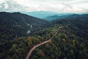 mountains and roads during the day photo