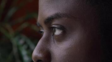 Close up of man staring an sipping drink video