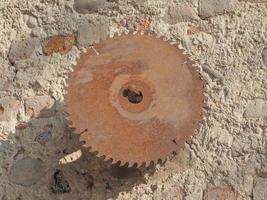 Circular saw hanged on wall photo