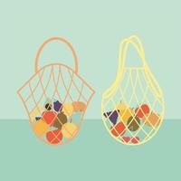 set of two eco bags with a fruits inside of it vector