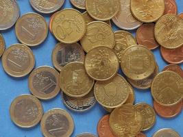 Euro coins, European Union over blue photo