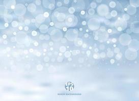 Winter blue background with bokeh on christmas holiday and new year. Vector illustration.