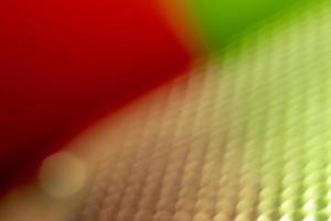 Abstract multicolor perforated metal background photo