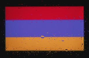 Drops of water on Armenia flag background. Shallow depth of field. Selective focus. Toned. photo