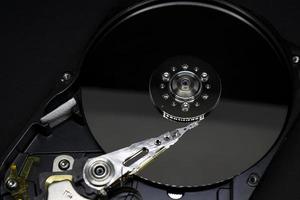 Magnetic disks inside HDD. Modern digital technology. photo