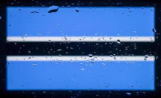 Drops of water on Botswana flag background. Shallow depth of field. Selective focus. Toned. photo