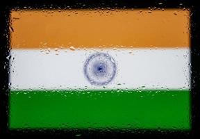 Drops of water on India flag background. Shallow depth of field. Selective focus. Toned. photo