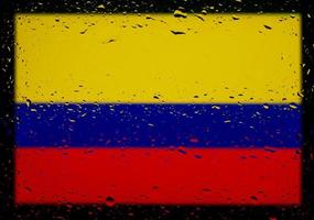 Drops of water on Colombia flag background. Shallow depth of field. Selective focus. Toned. photo