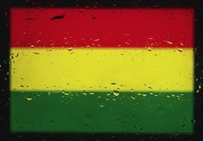 Drops of water on Bolivia flag background. Shallow depth of field. Selective focus. Toned. photo