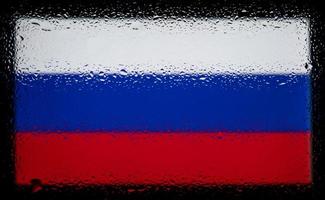 Drops of water on Russia flag background. Shallow depth of field. Selective focus. Toned. photo