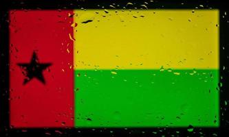 Drops of water on guinea bissau flag background. Shallow depth of field. Selective focus. Toned. photo