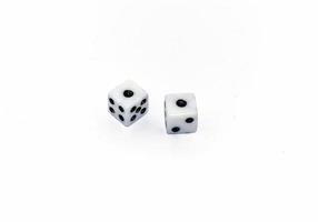 Top view of two white dices isolated on white photo