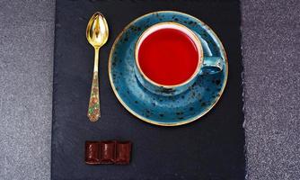 Red Tea in Beautiful Cup photo