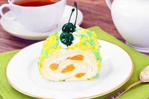 Sponge Roulade with Cream, Mandarin and Cherry photo