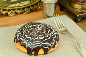 Cake with chocolate on a plate. photo