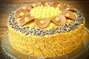 Delicious Honey Cake Decorated with Chocolate. photo