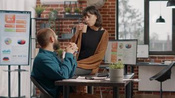 Man and woman brainstorming ideas to plan business project video