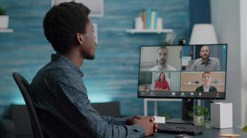 Selective focus on african american man on online conference video call