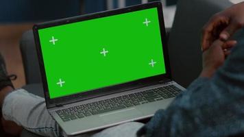 Close up of mock up green screen laptop display