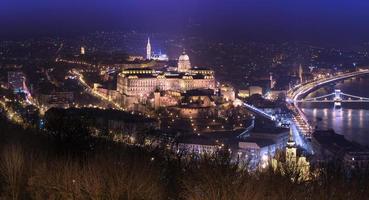 Night panorama of Budapest with Buda Castle, popular architecture landmark of the Hungarian capital, Hungary photo