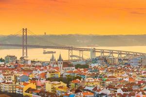 Picturesque sunset in Lisbon. Evening cityscape of the Portugal capital city photo