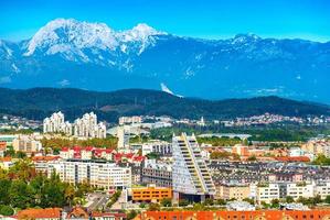 Picturesque cityscape of Ljubljana with mountains in the background, Slovenia photo