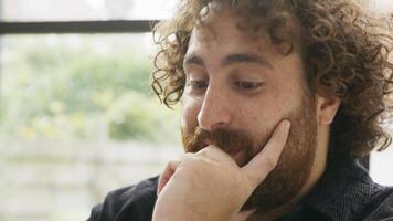 Close up of man having video call and typing